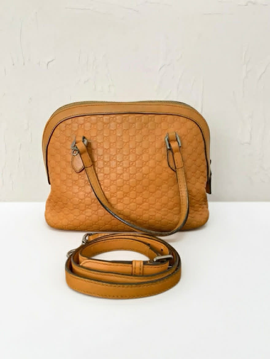 Gucci GG Embossed Dome Bag (Mini / Small)